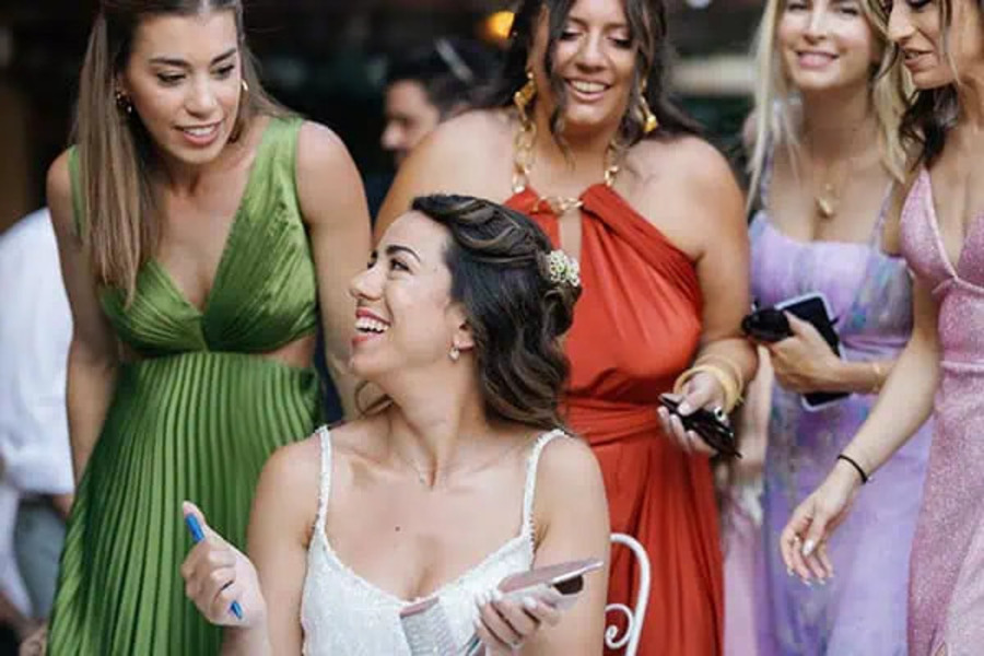 Elias & Mikaela Wedding in Andros bride is preparing with friends