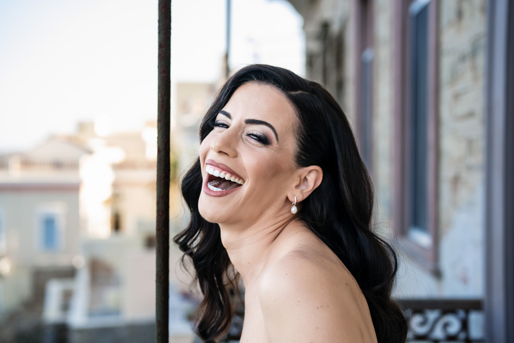 A romantic wedding in Syros - Ilia & Flavio - laughing bride