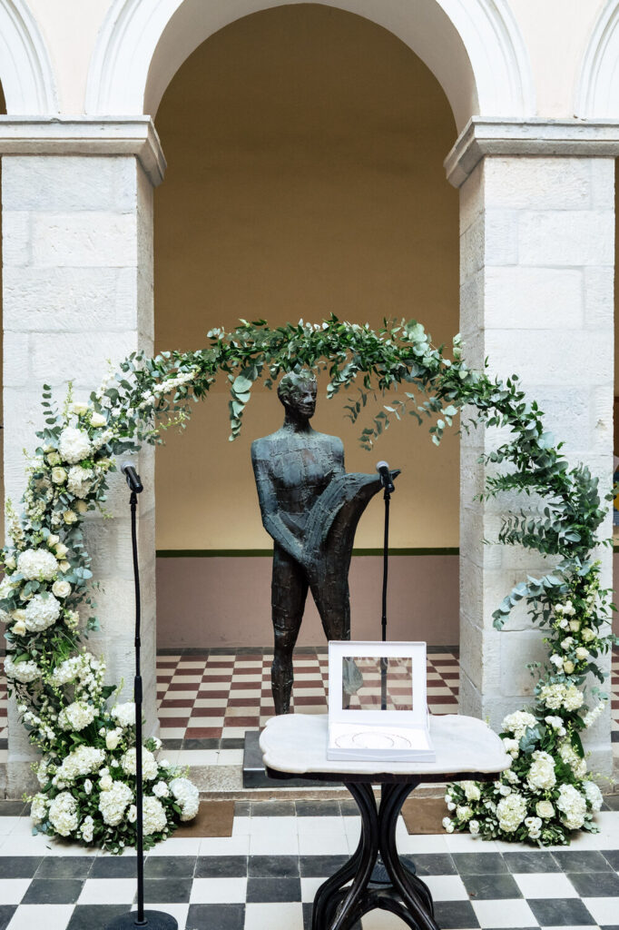 A romantic wedding in Syros - Ilia & Flavio - floral arch