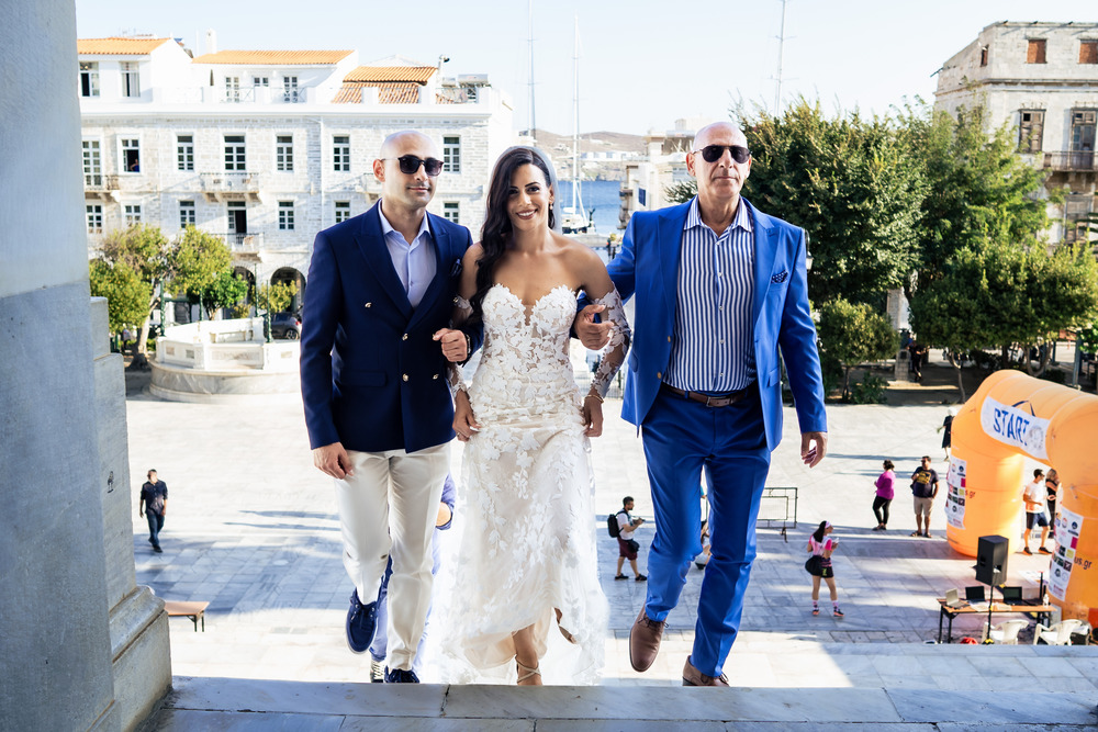 A romantic wedding in Syros - Ilia & Flavio -bride arrives to the ceremony