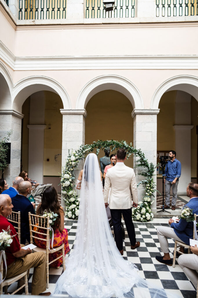 A romantic wedding in Syros - Ilia & Flavio - bride's veil and train
