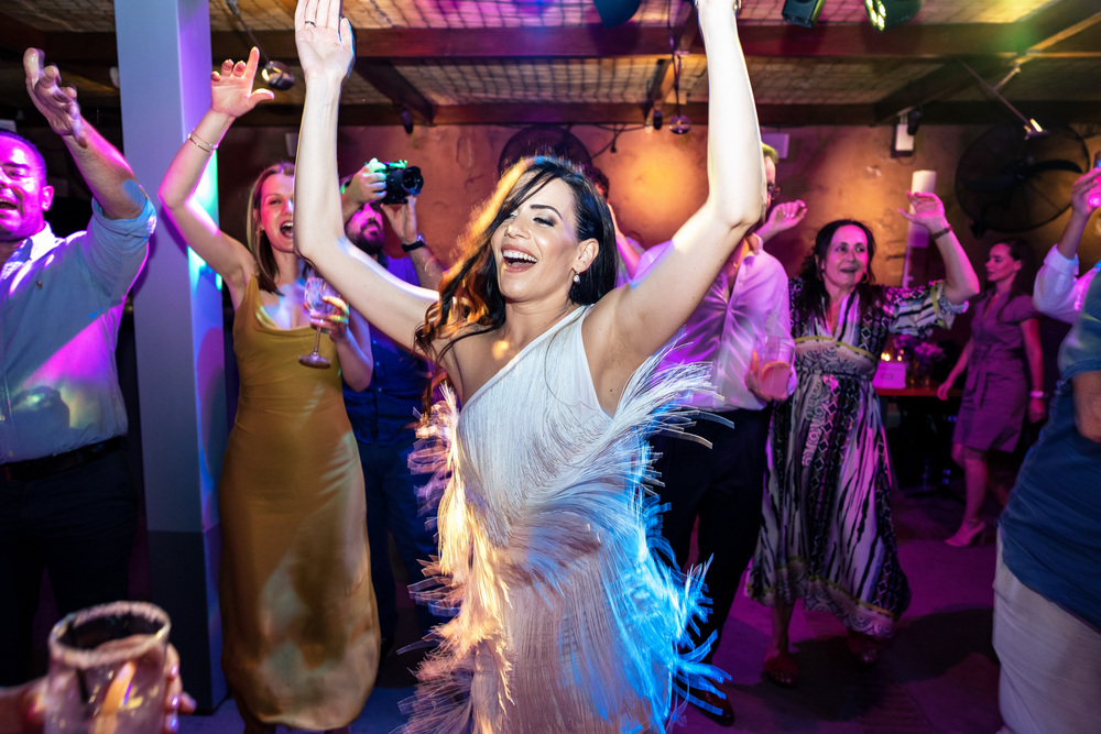 A romantic wedding in Syros - Ilia & Flavio - bride dancing
