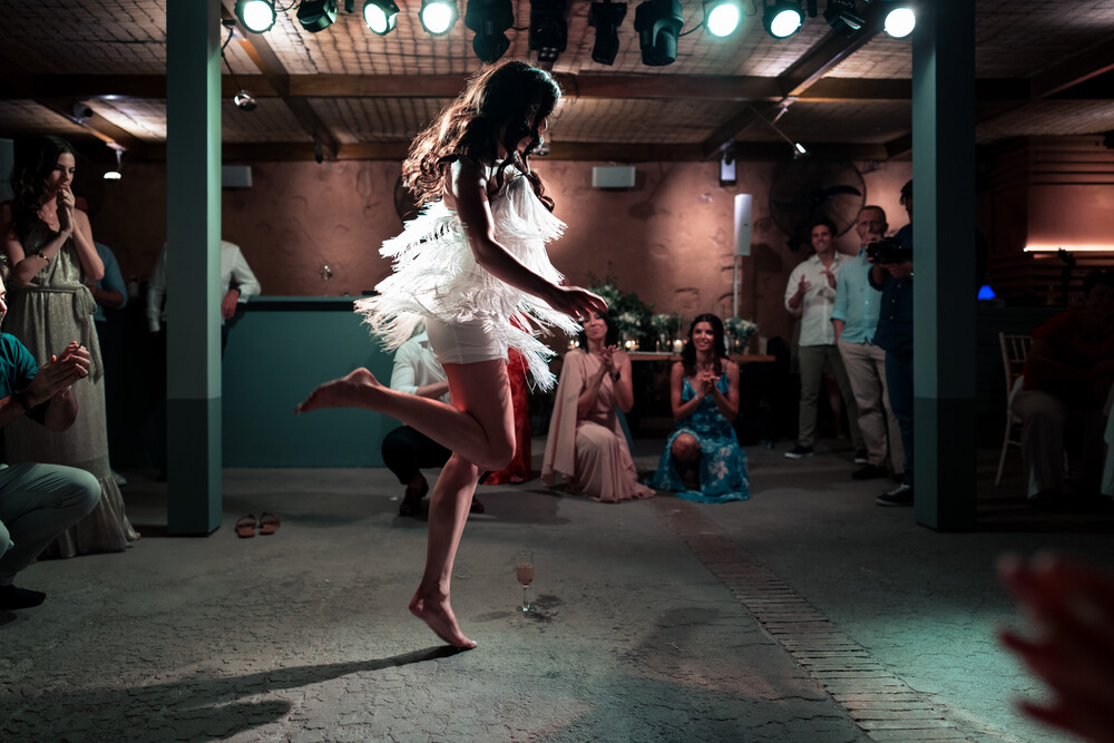 A romantic wedding in Syros - Ilia & Flavio -bride having a ball