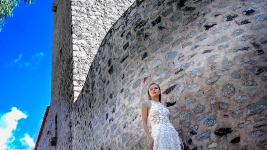 Arapakis Castle Wedding beautiful bride standing on Tower